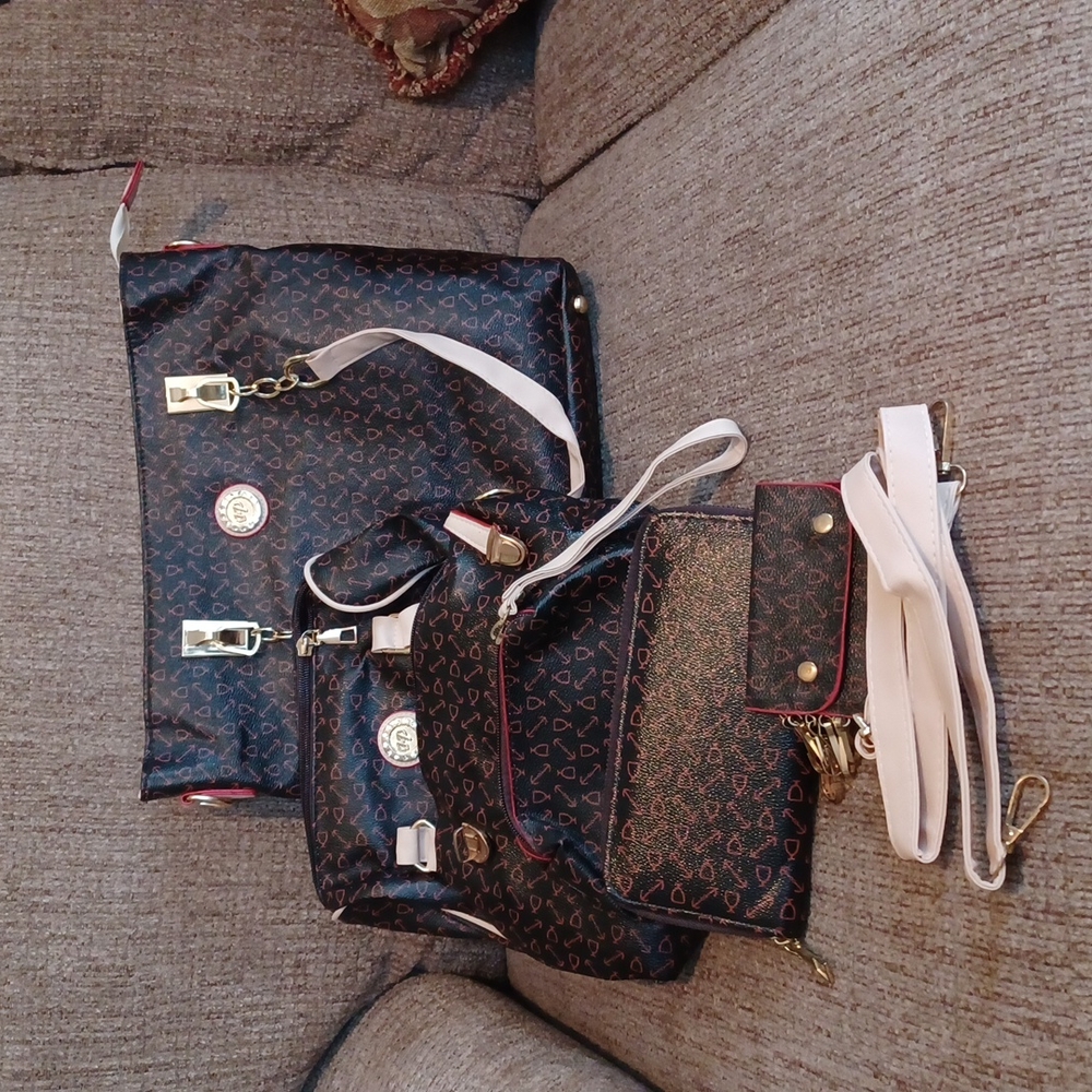 6pcs Crossover shoulder body bag black with red trim.